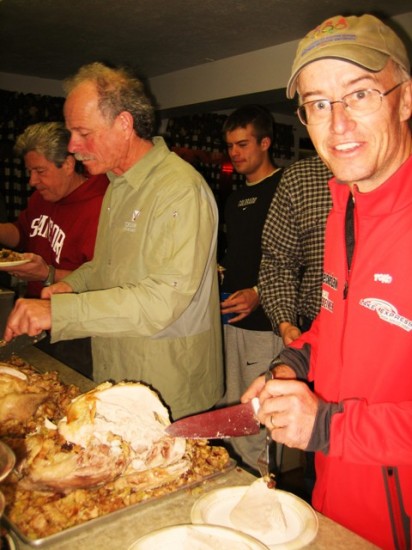 Bill Pierce carving one of our four turkeys (no leftovers!)